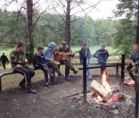 У костра