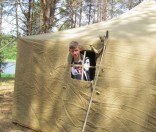 В  палатке